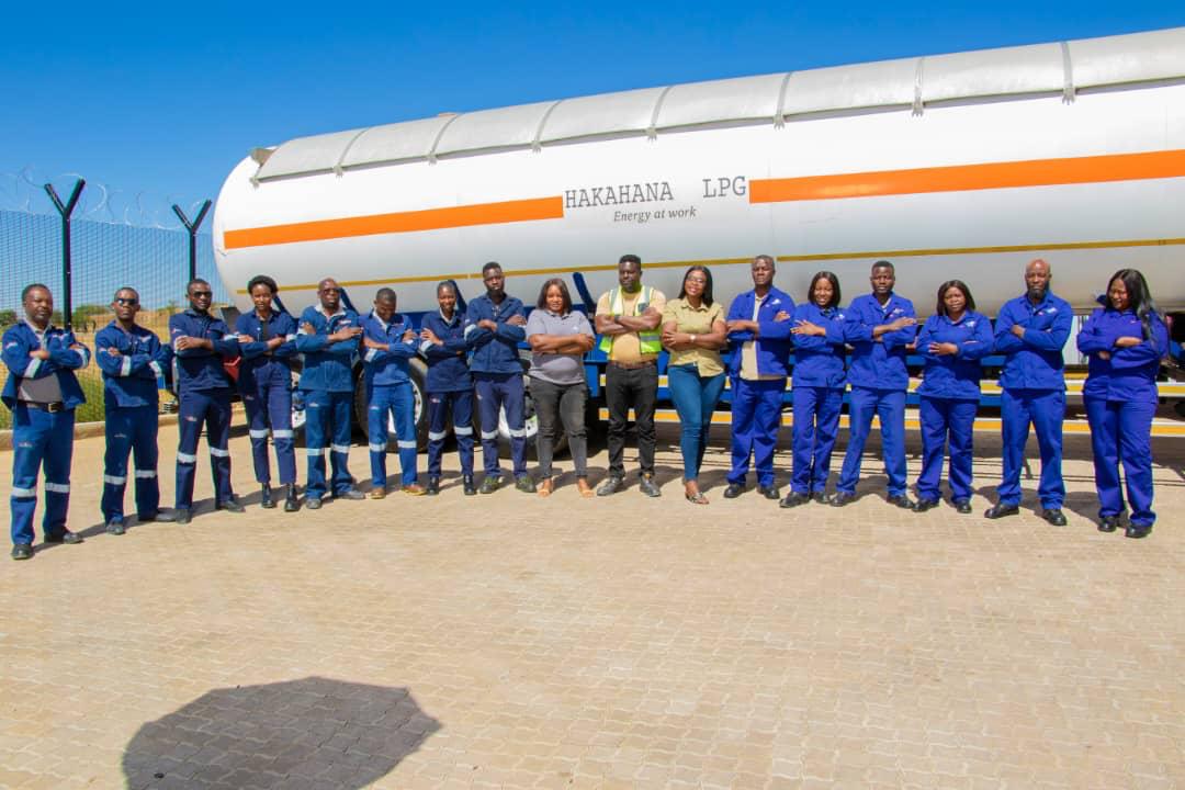 Hakahana Lacho Power and Gas team standing in front of an LPG tanker