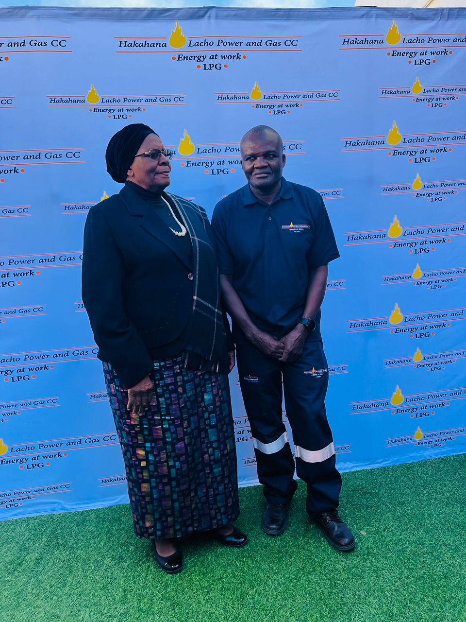 Two guests posed together at the branch opening